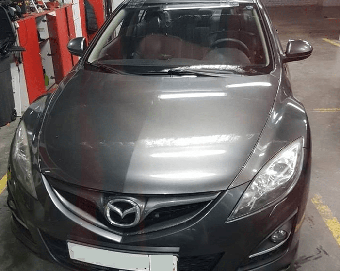 фото замена лобового мазда